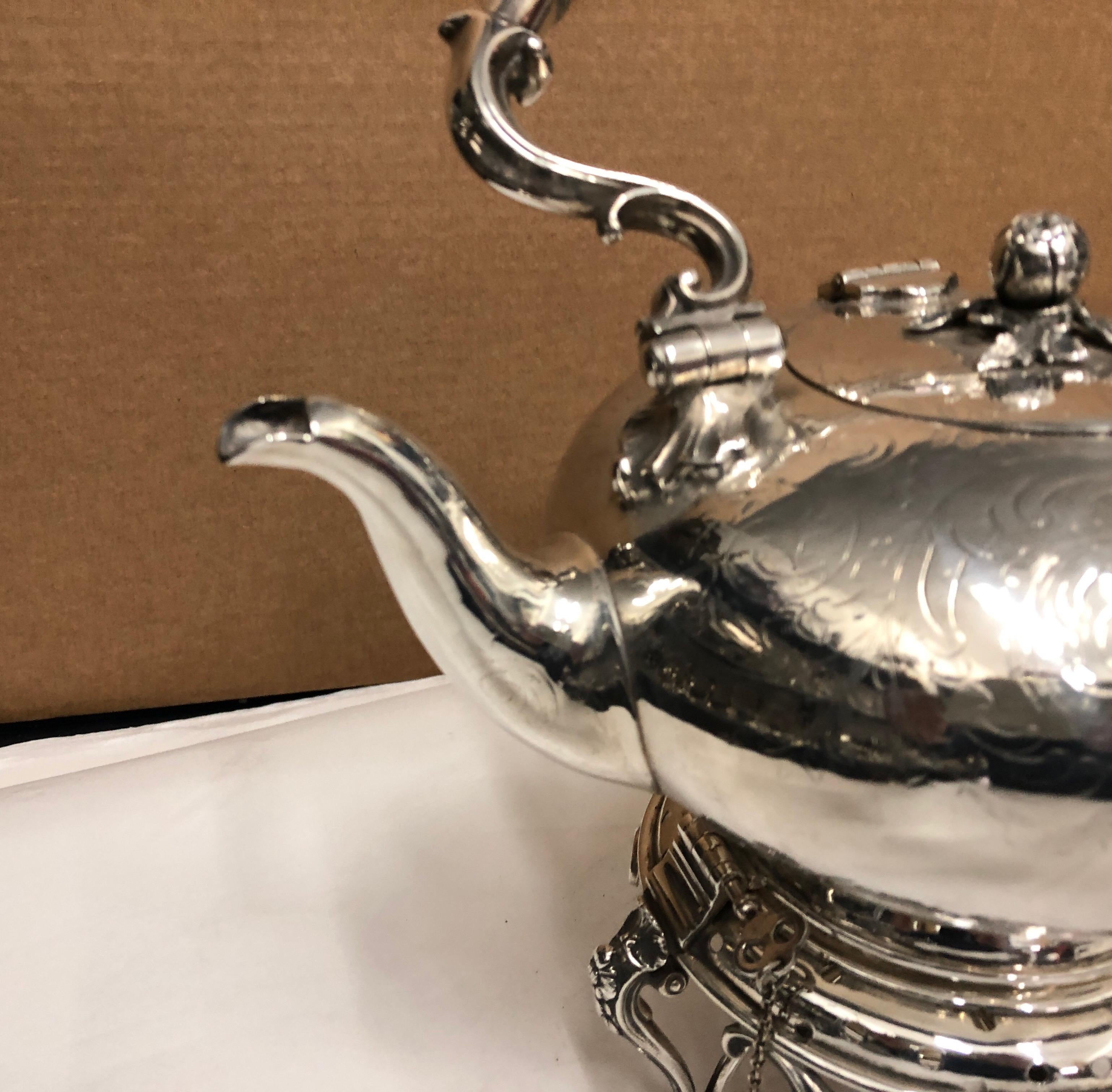 An engraved silver plated English kettle made in 1870, marked on the bottom, original conditions.