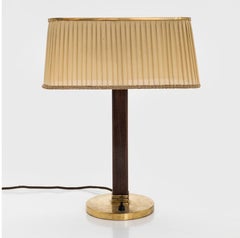 A table lamp by Paavo Tynell for Taito Oy