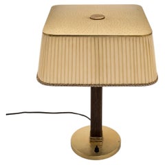 A table lamp by Paavo Tynell for Taito Oy