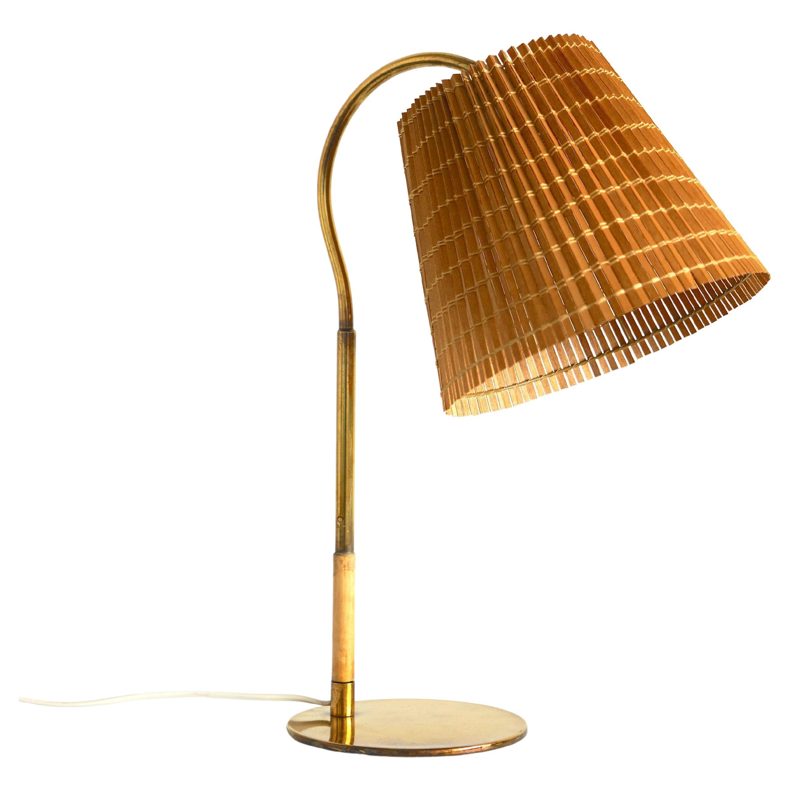 A table lamp by Paavo Tynell, model 9201 / 2 available.