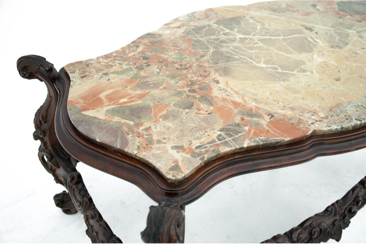 Other A table with a marble top, Italy, early Of the twentieth century. For Sale