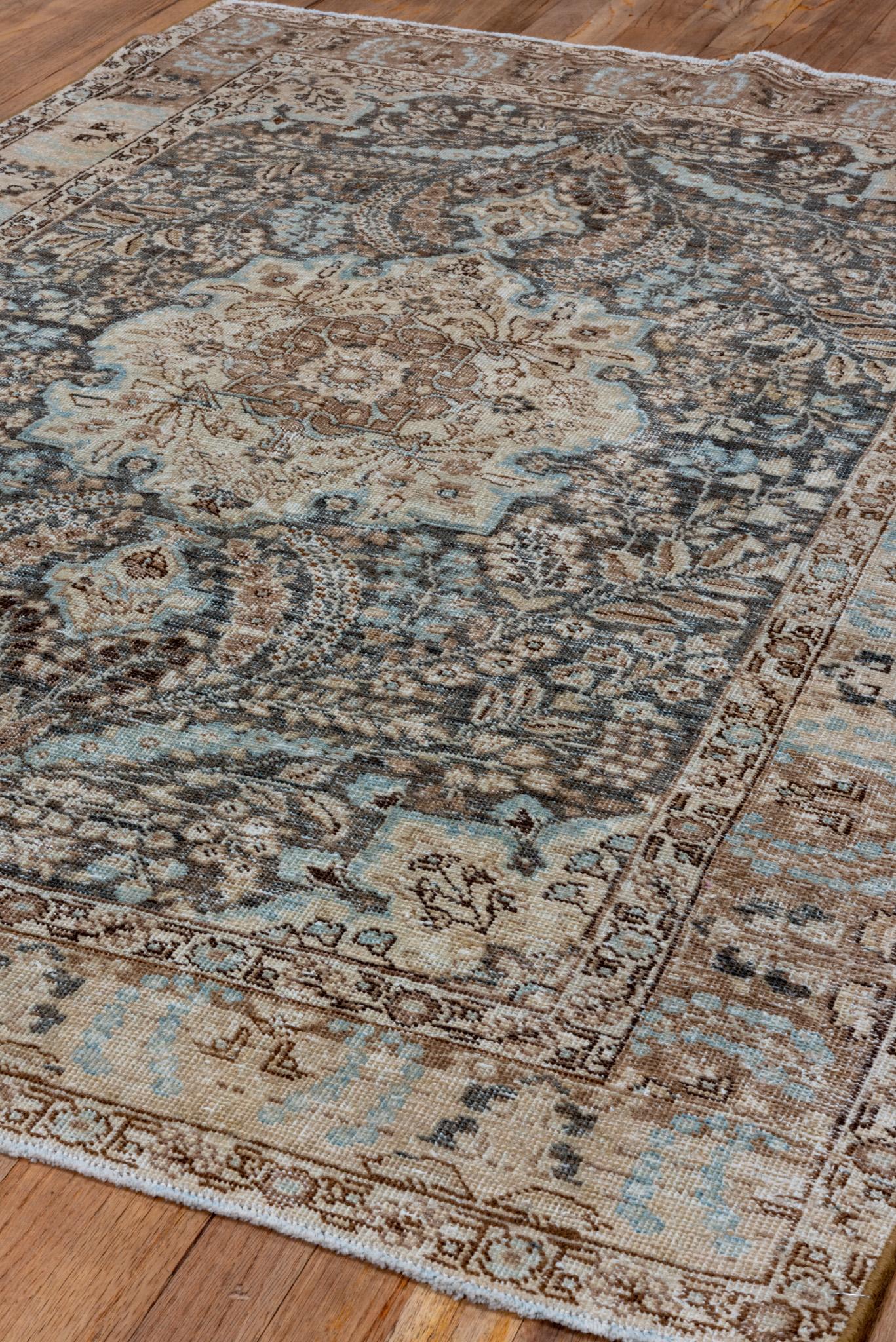 A Tabriz Rug circa 1930. Hand Knotted and made of 100% wool yarn.