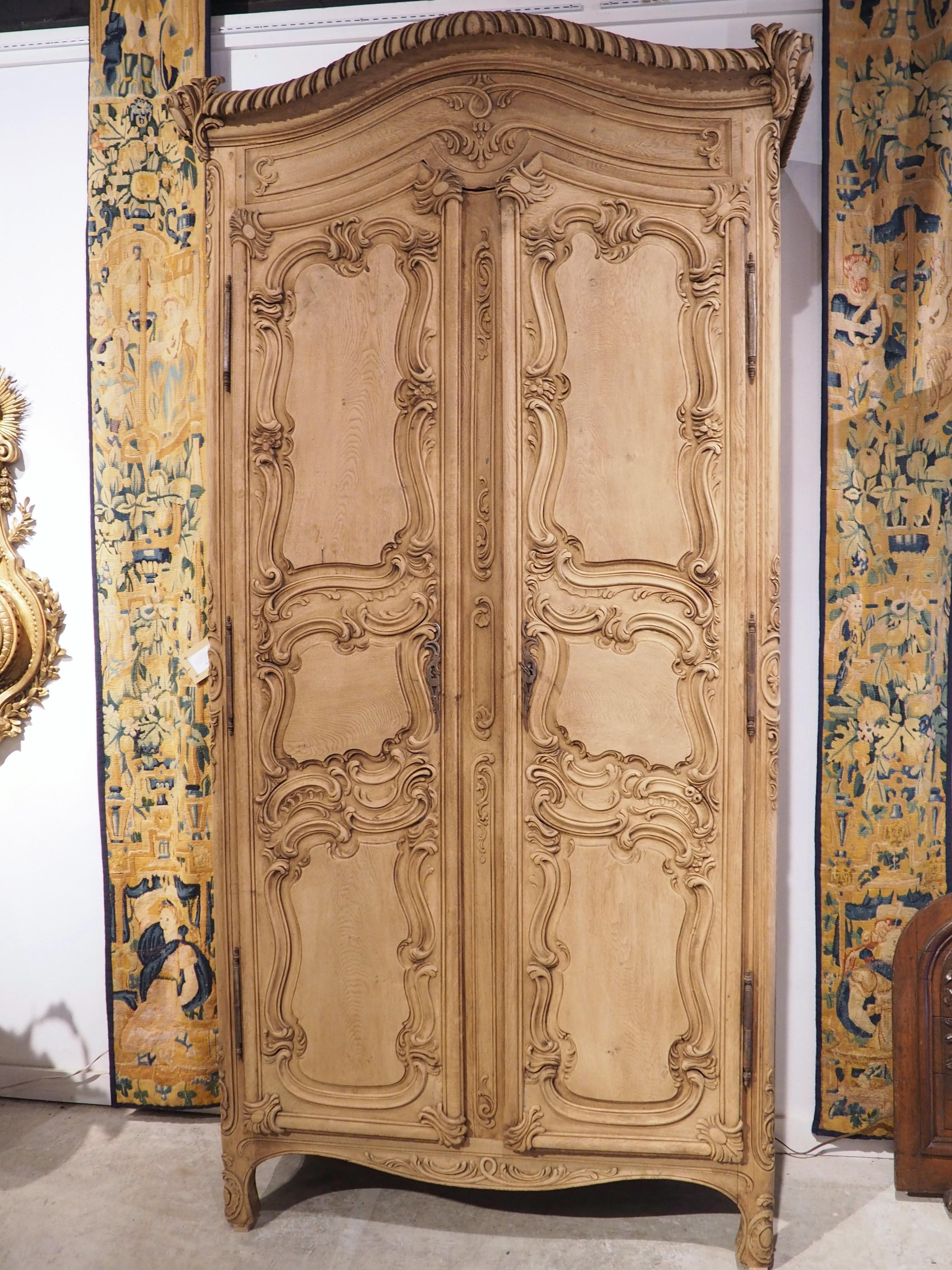 Tall and Narrow Early 1800s Bleached French Armoire in Carved and Pegged Oak 7
