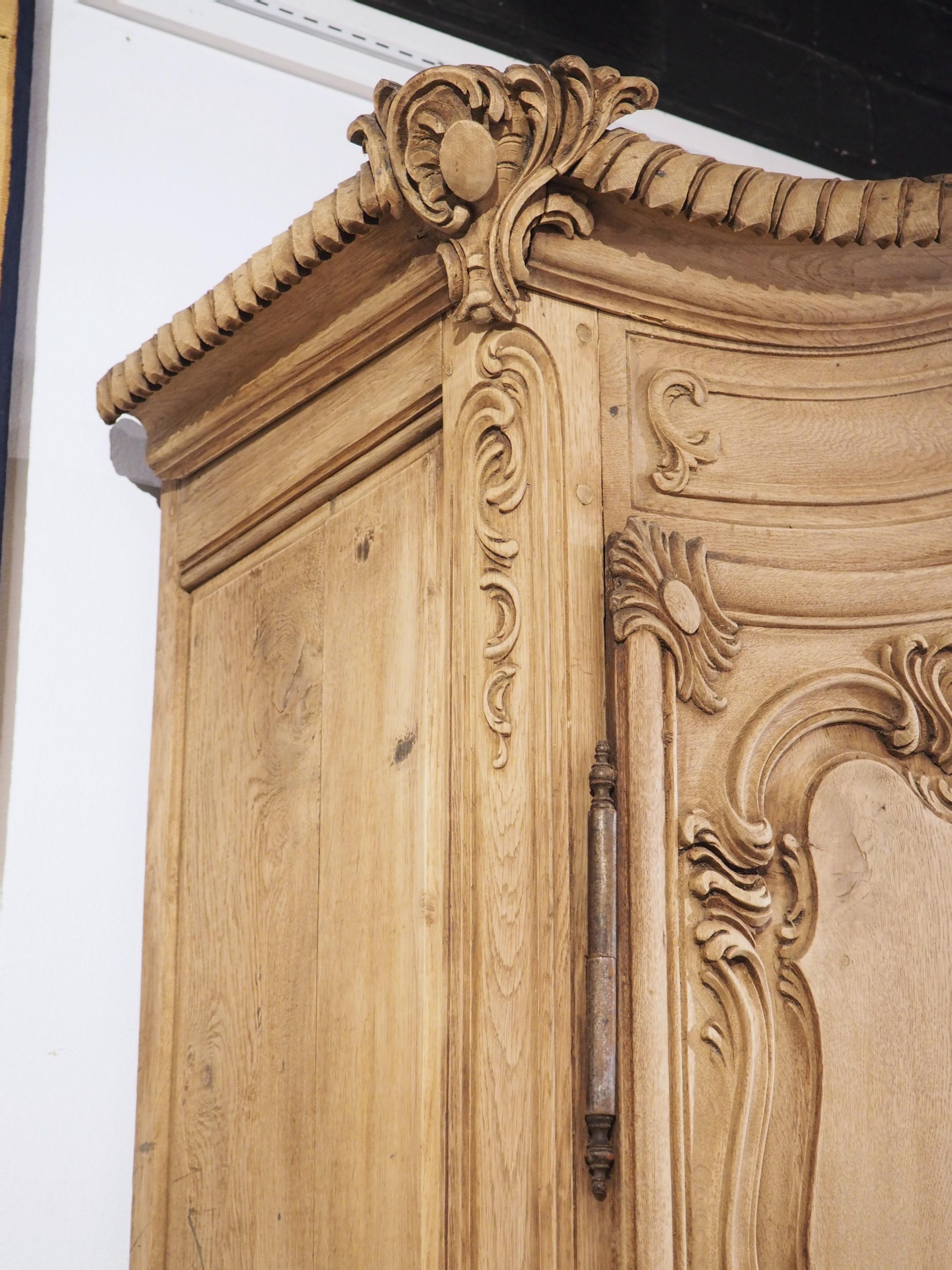 Tall and Narrow Early 1800s Bleached French Armoire in Carved and Pegged Oak In Good Condition In Dallas, TX