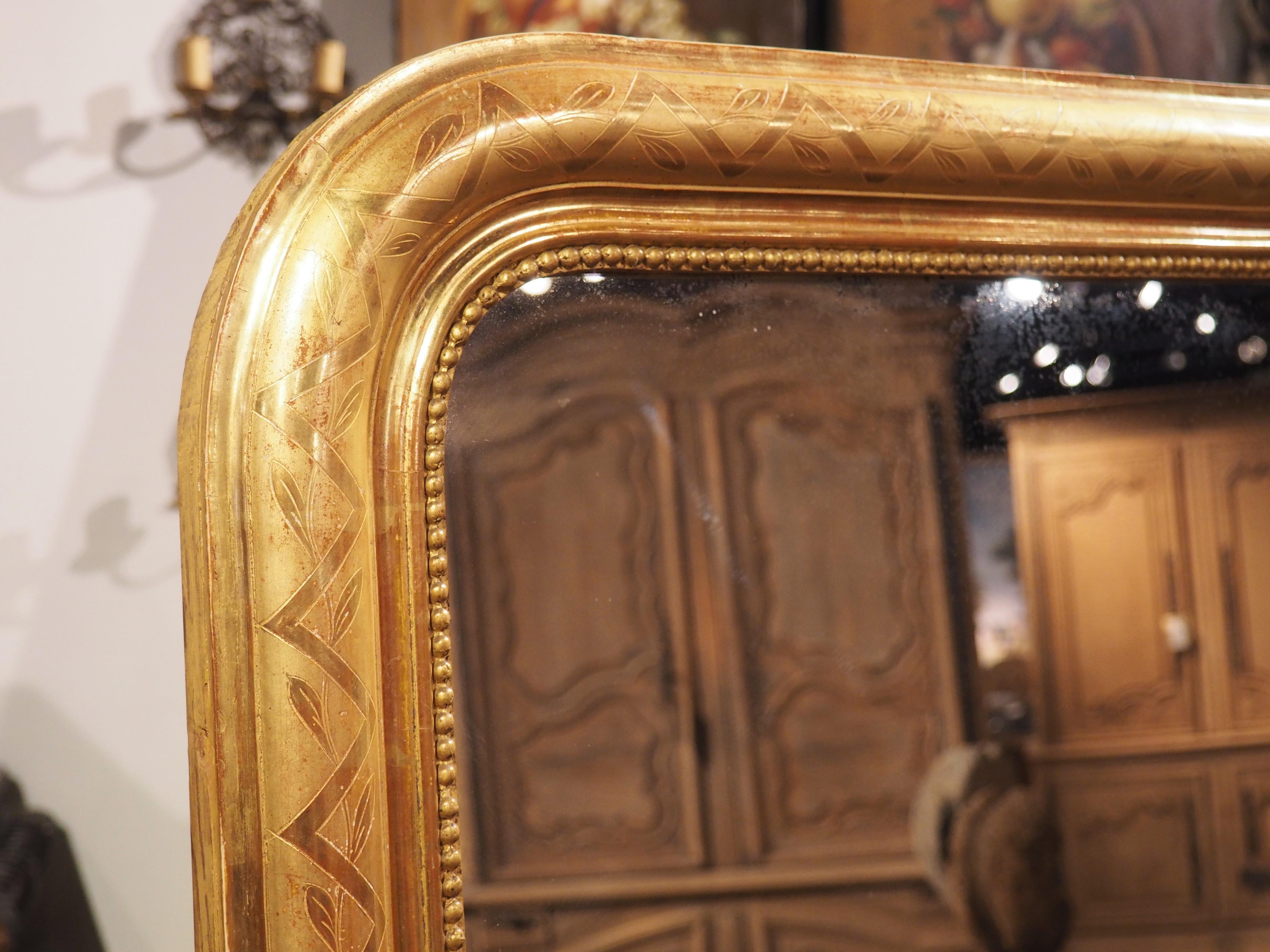 Known for understated elegance by means of subtle embellishments, Louis Philippe mirrors are always in high demand, as the clean lines mesh with almost any style of design. Our tall gold leaf mirror from France is no exception, despite a commanding