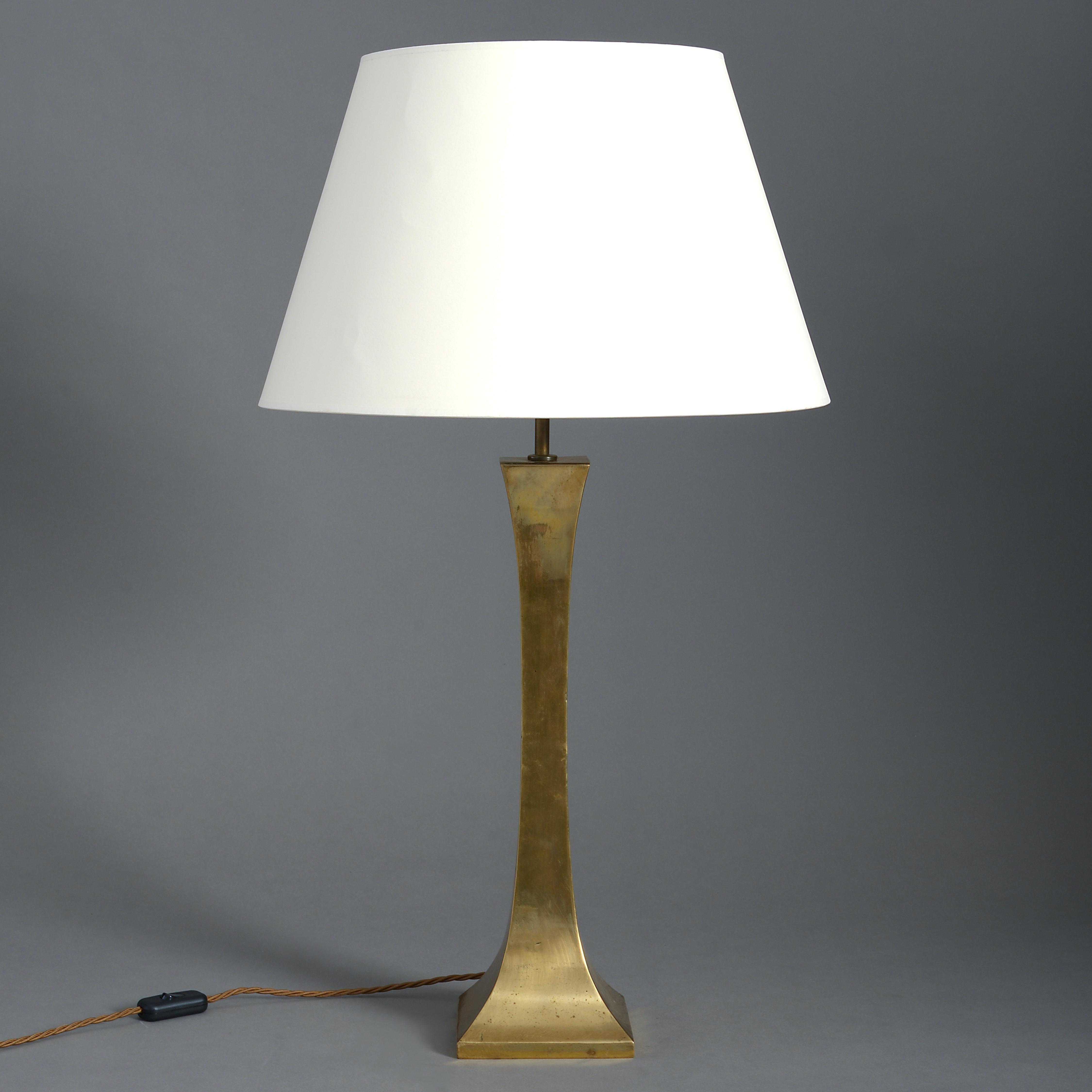 A mid-20th century tall brass table lamp of square concave form.
 