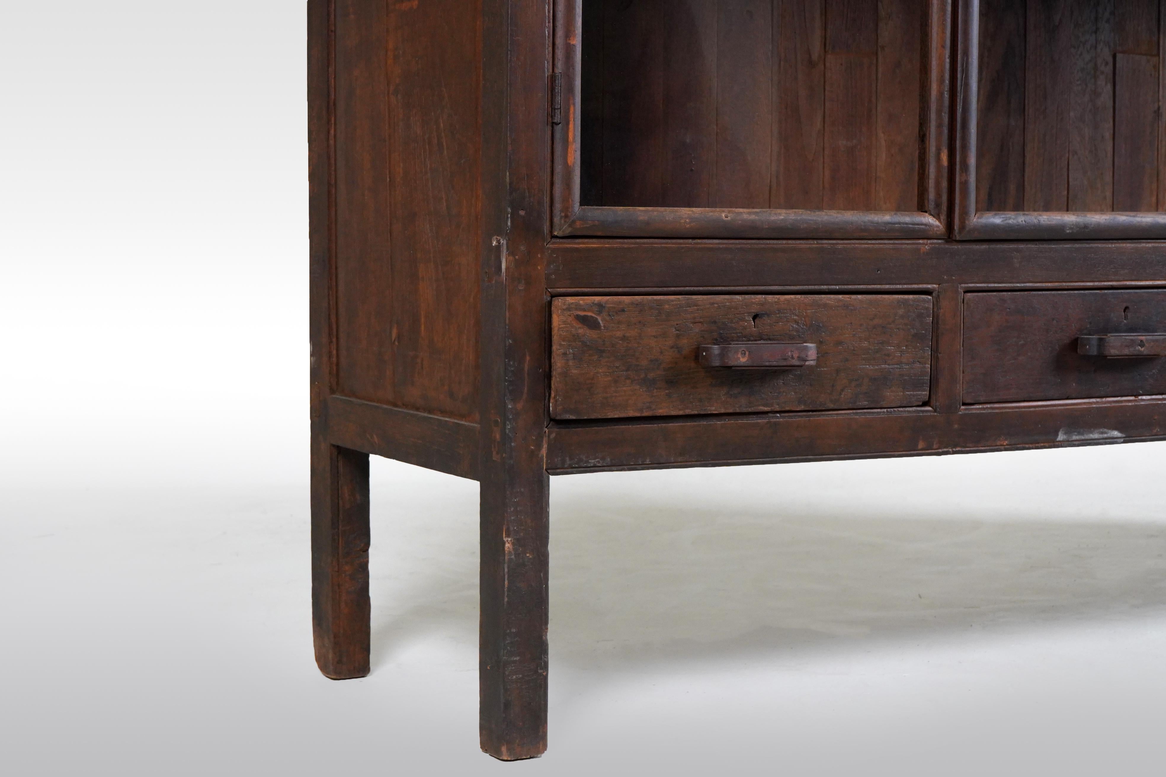 A Tall British Colonial Bookcase 6