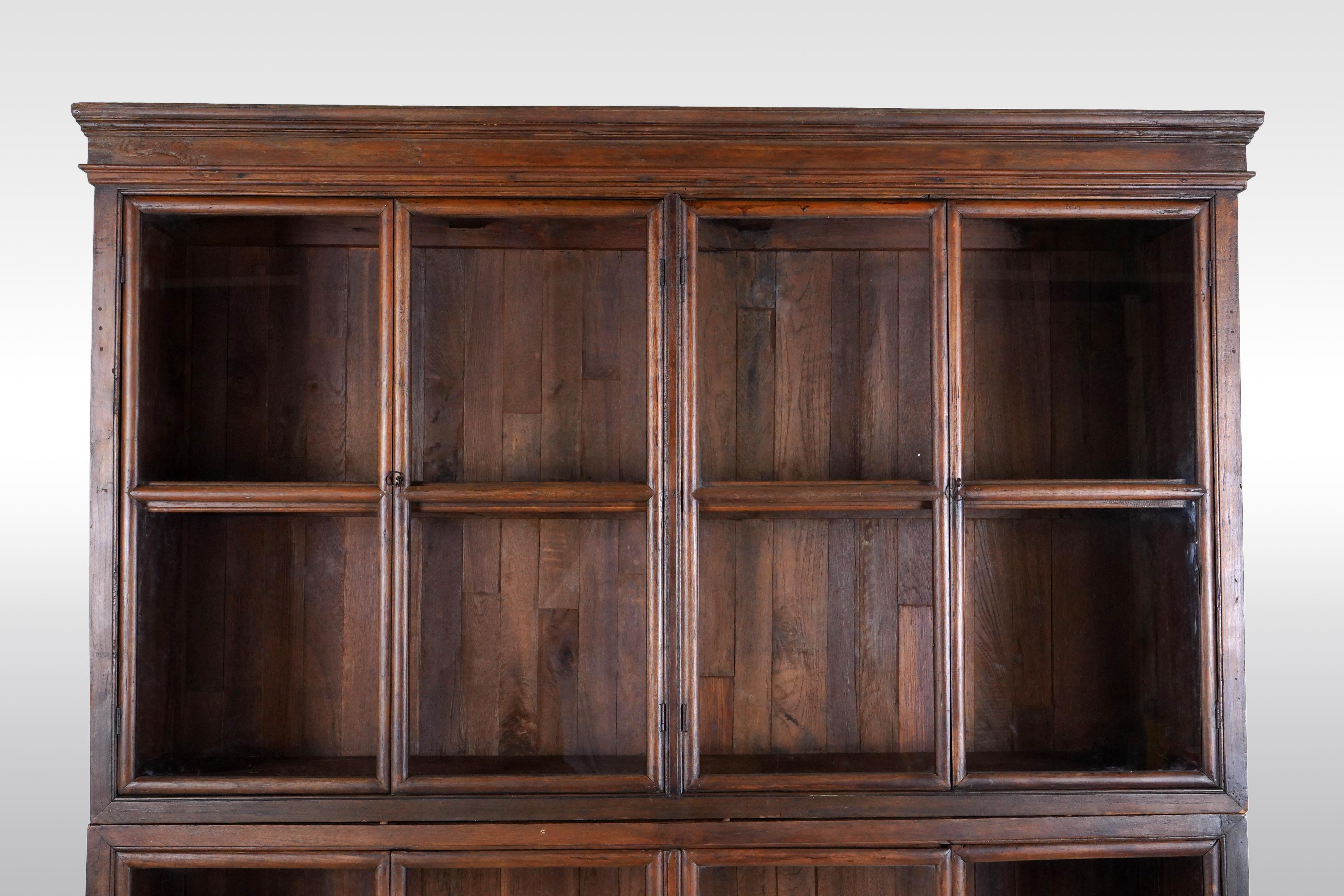 A Tall British Colonial Bookcase 1