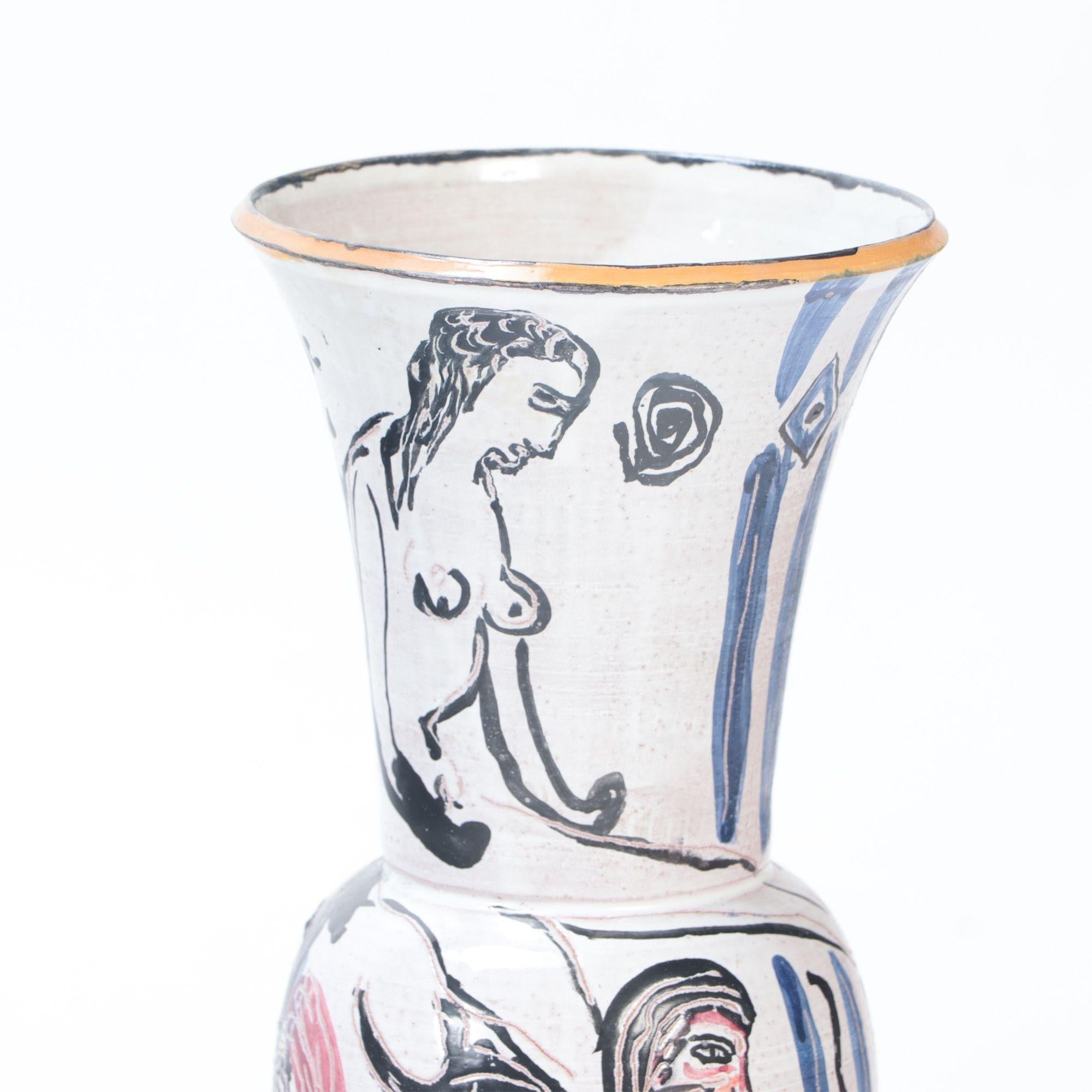 A tall ceramic vase by Anette Wandrer, Germany, c. 2000.
Annette Wandrer created a new technique which applies her art on her ceramic pieces.