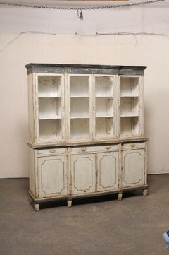 A Tall French Antique Deux Corps Cabinet