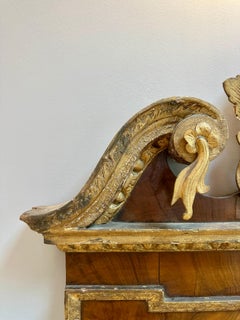 A Tall George II Giltwood And Walnut Pier Mirror