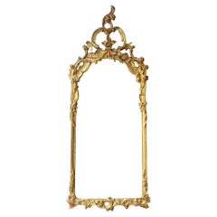 Un grand modèle sculpté de George III  Miroir d'embarcadère Rococo en bois doré
