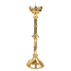 A tall gilt brass European Gothic Revival pricket candlestick