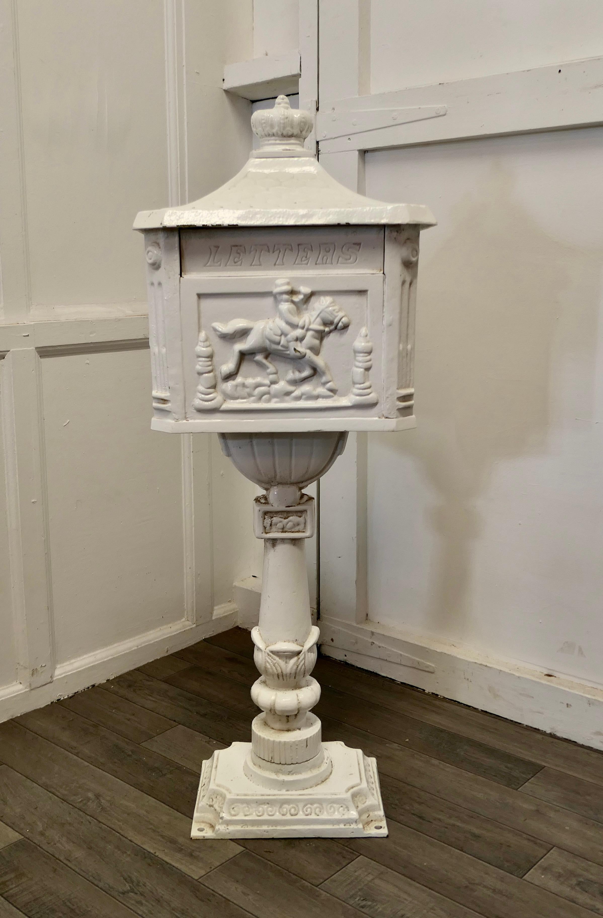 A tall ground standing mail box, letter box
A great piece decorated with country scenes and a crown on the top
The mail box is free standing and can be bolted to the ground, it has a letter box sprung opening to the front and a large storage