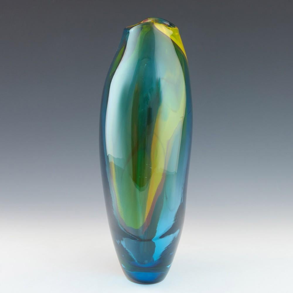 A Tall Horizon Blue Studio Glass Vase by Phil Atrill, 2023

Additional information:
Date : 2023
Origin : Surrey, England
Bowl Features : Bottle form that tapers to a 1cm neck with 5mm apperture
Marks : Signed on base Phil Attrill
Type : Lead
