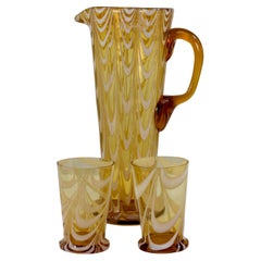 Vintage An Art Deco tall lemonade jug and a matching pair of drinking glasses.