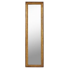A Tall Louis XVI Style Giltwood Mirror