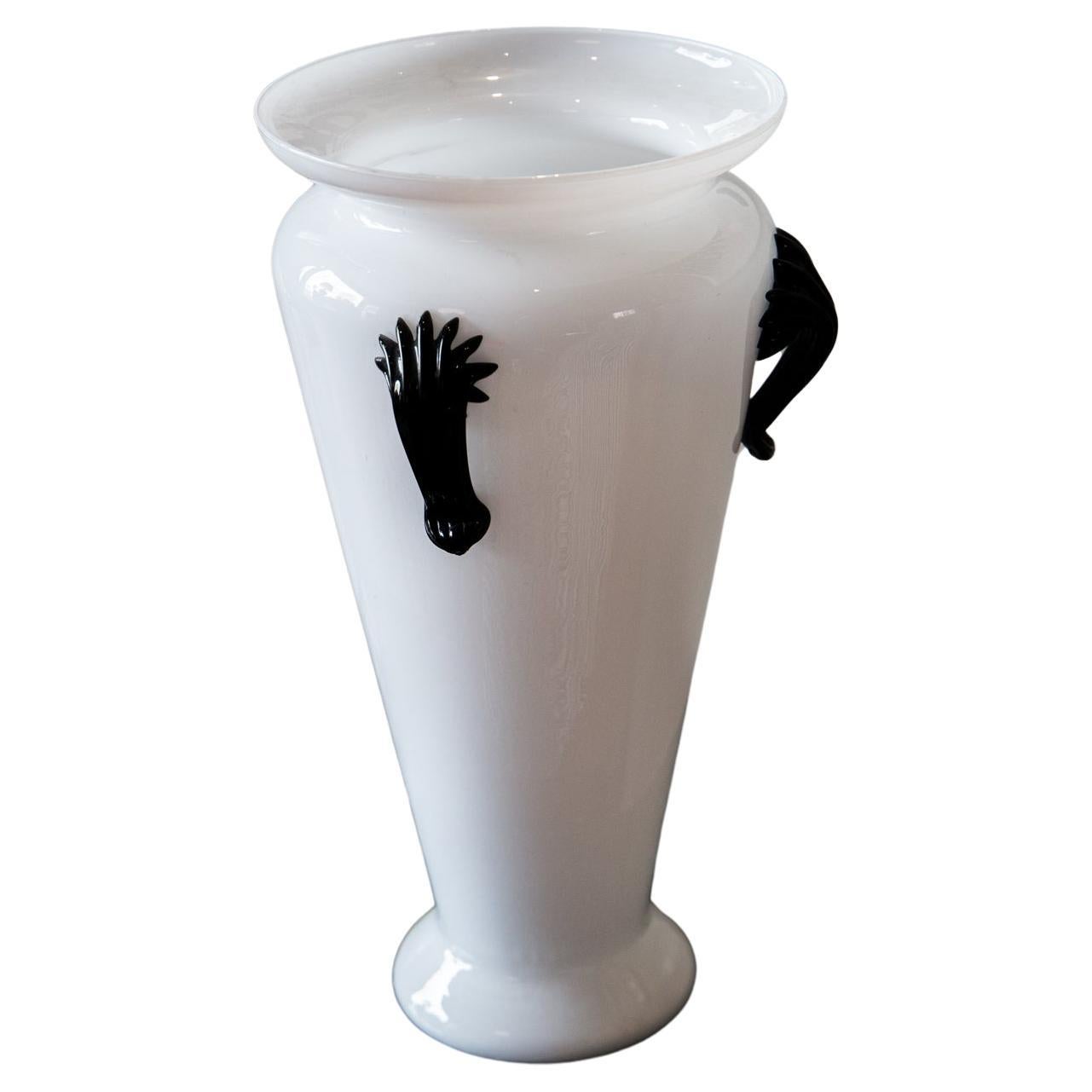 A tall mid-century Murano white opaque vase with black torch handles, Italy 