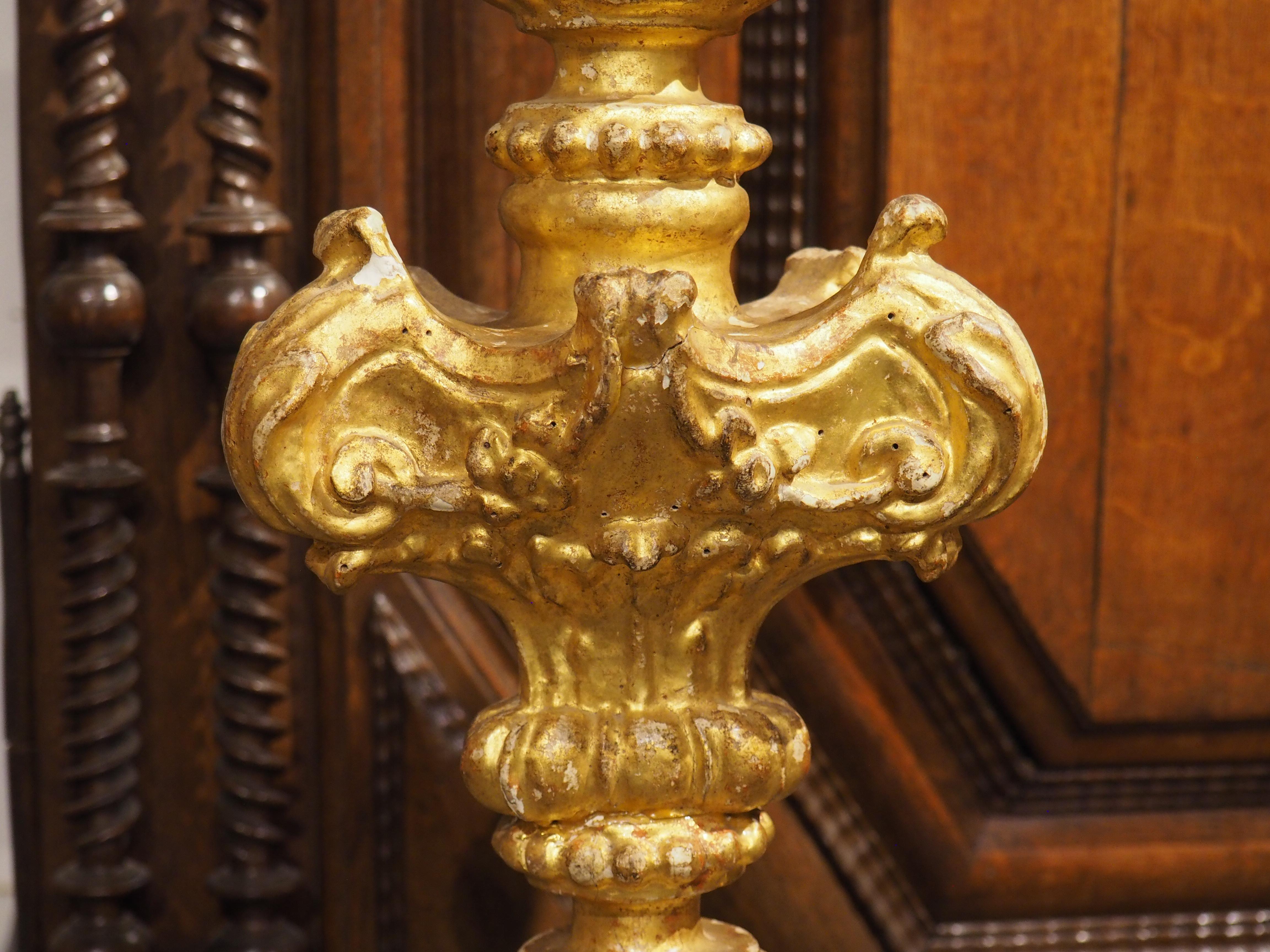 Wood A Tall Pair of 18th Century Giltwood Candlesticks from France For Sale