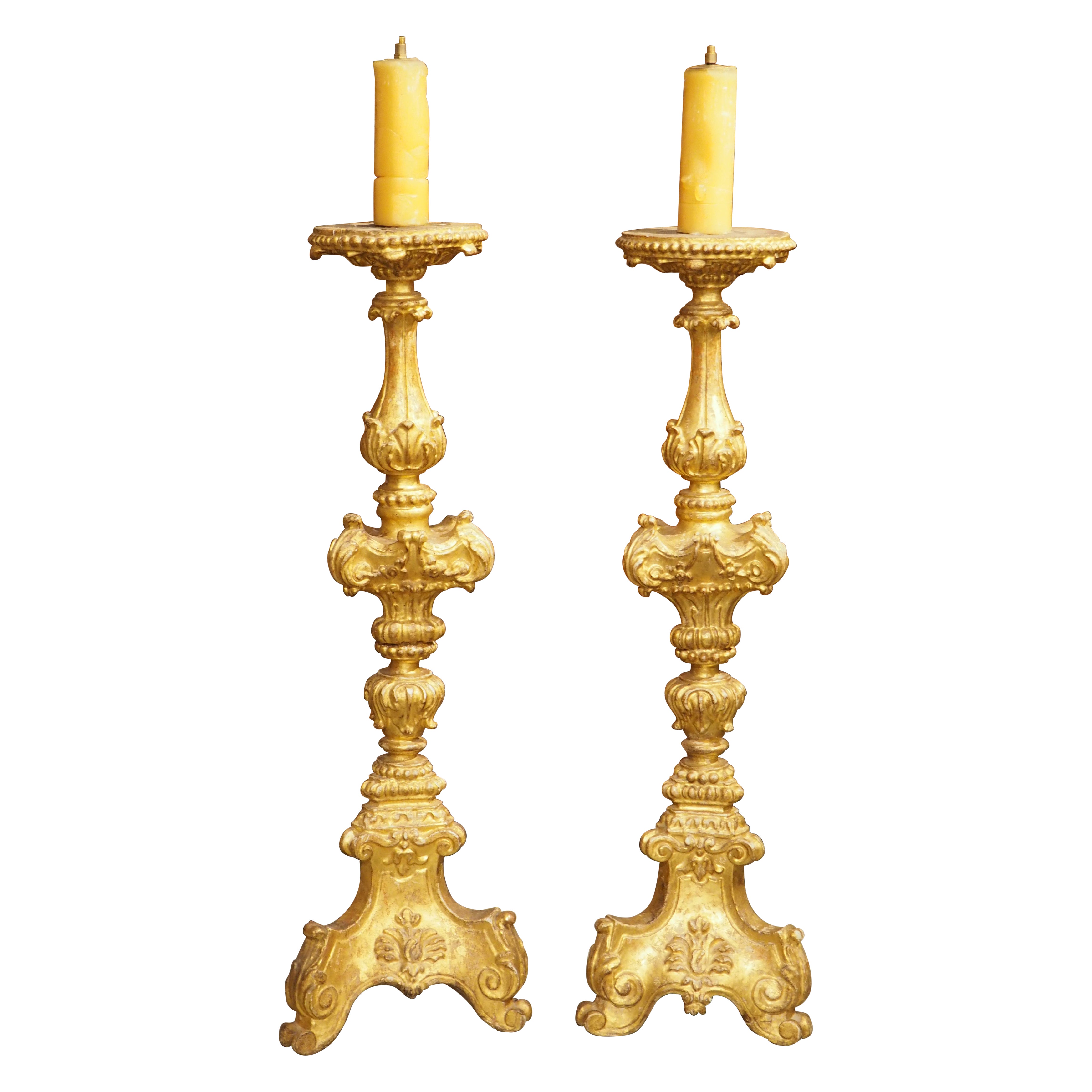 A Tall Pair of 18th Century Giltwood Candlesticks from France For Sale