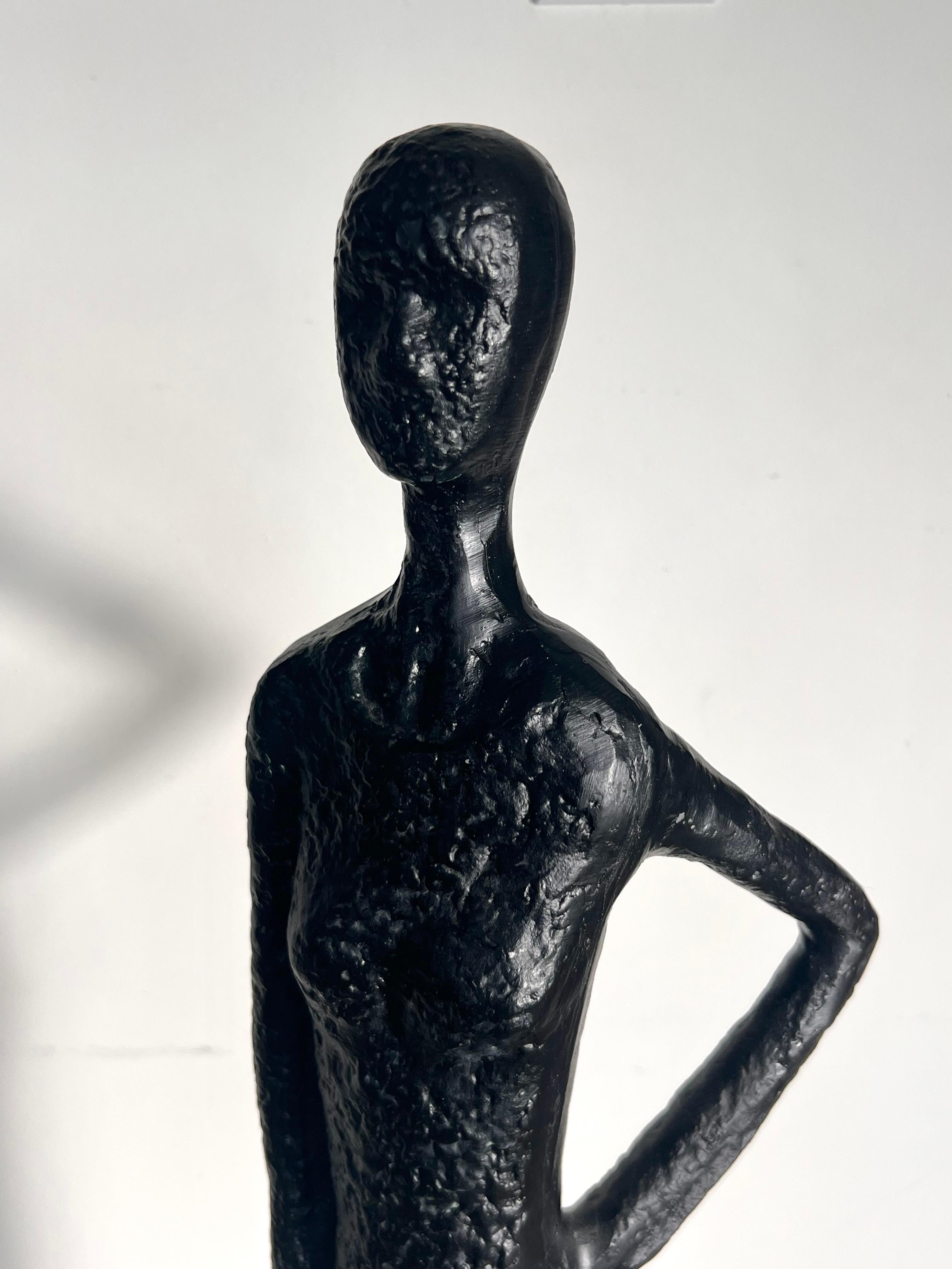 A tall pair of Giacometti style figurative floor sculptures, 20th century  4