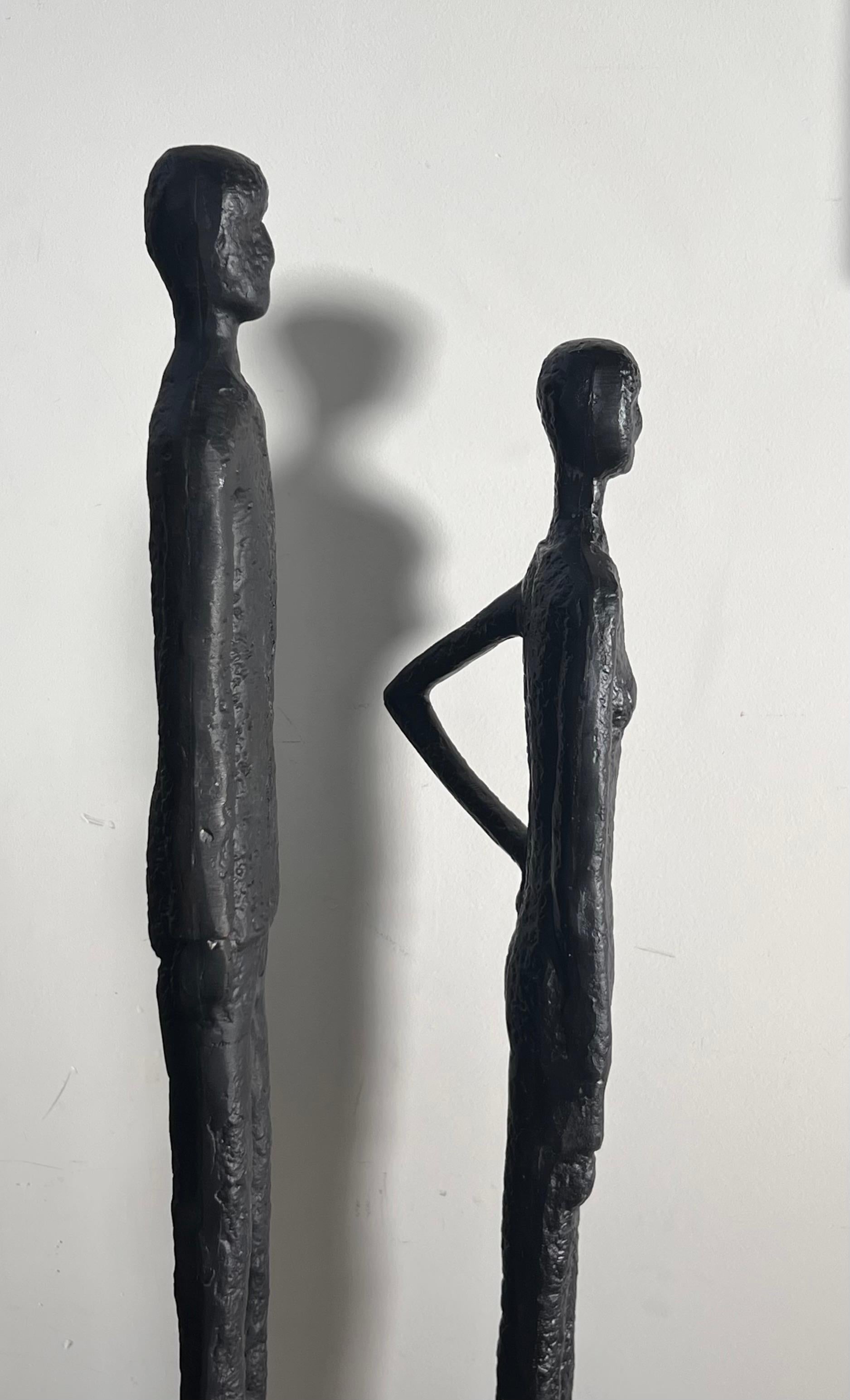 A tall pair of Giacometti style figurative floor sculptures, 20th century  7