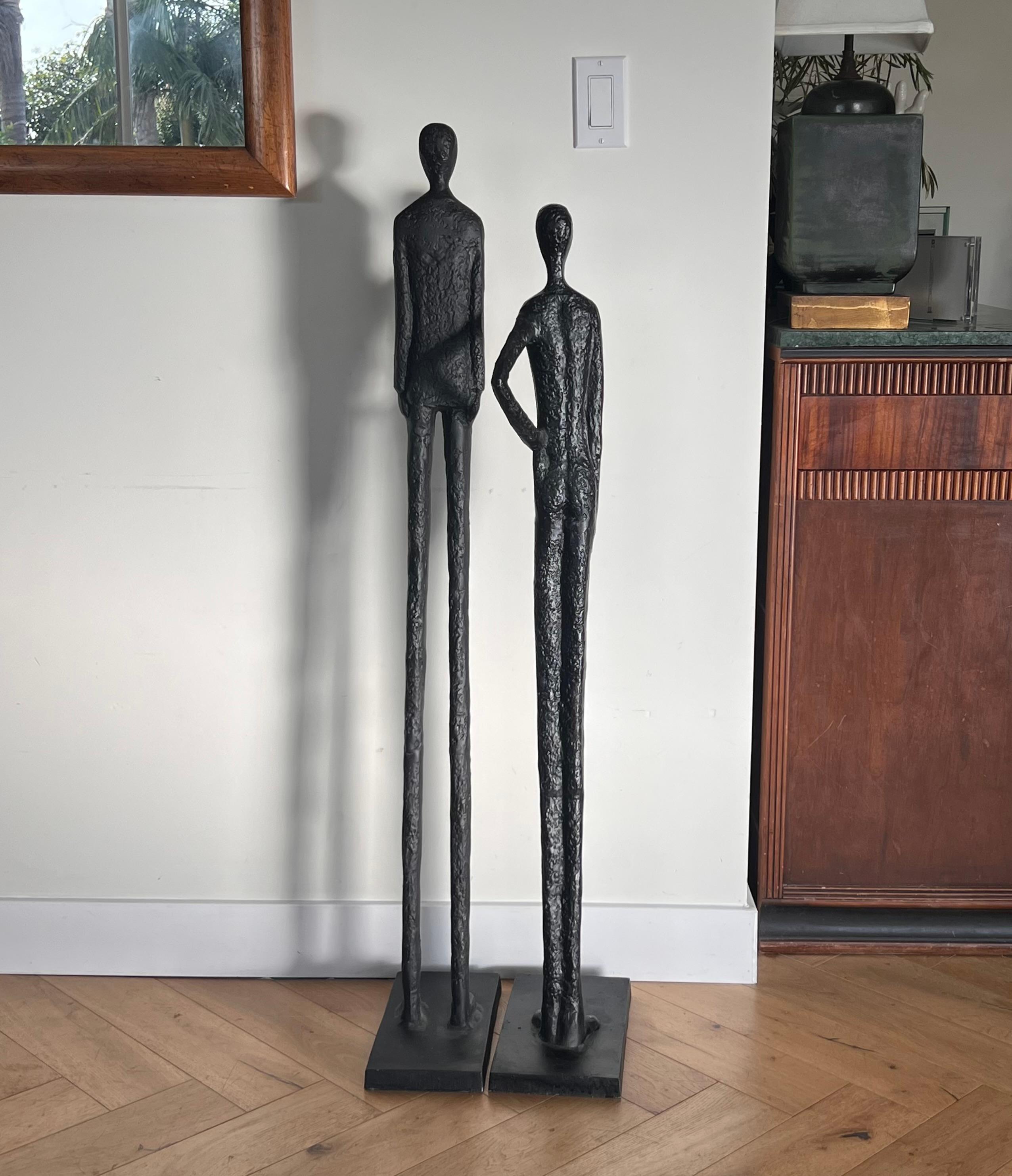 A tall pair of Giacometti style figurative floor sculptures, 20th century  8