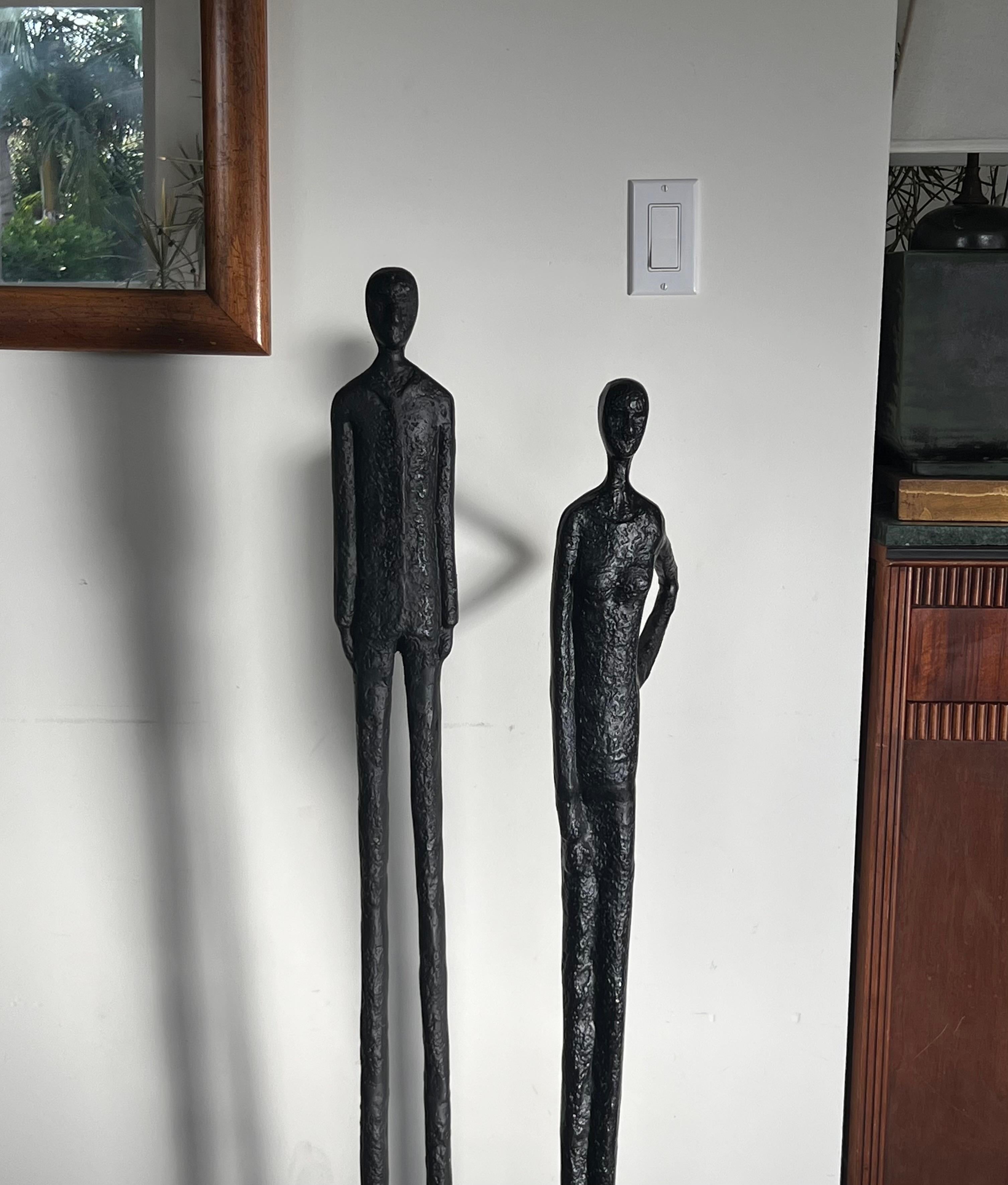 A tall pair of Giacometti style figurative floor sculptures, 20th century  9