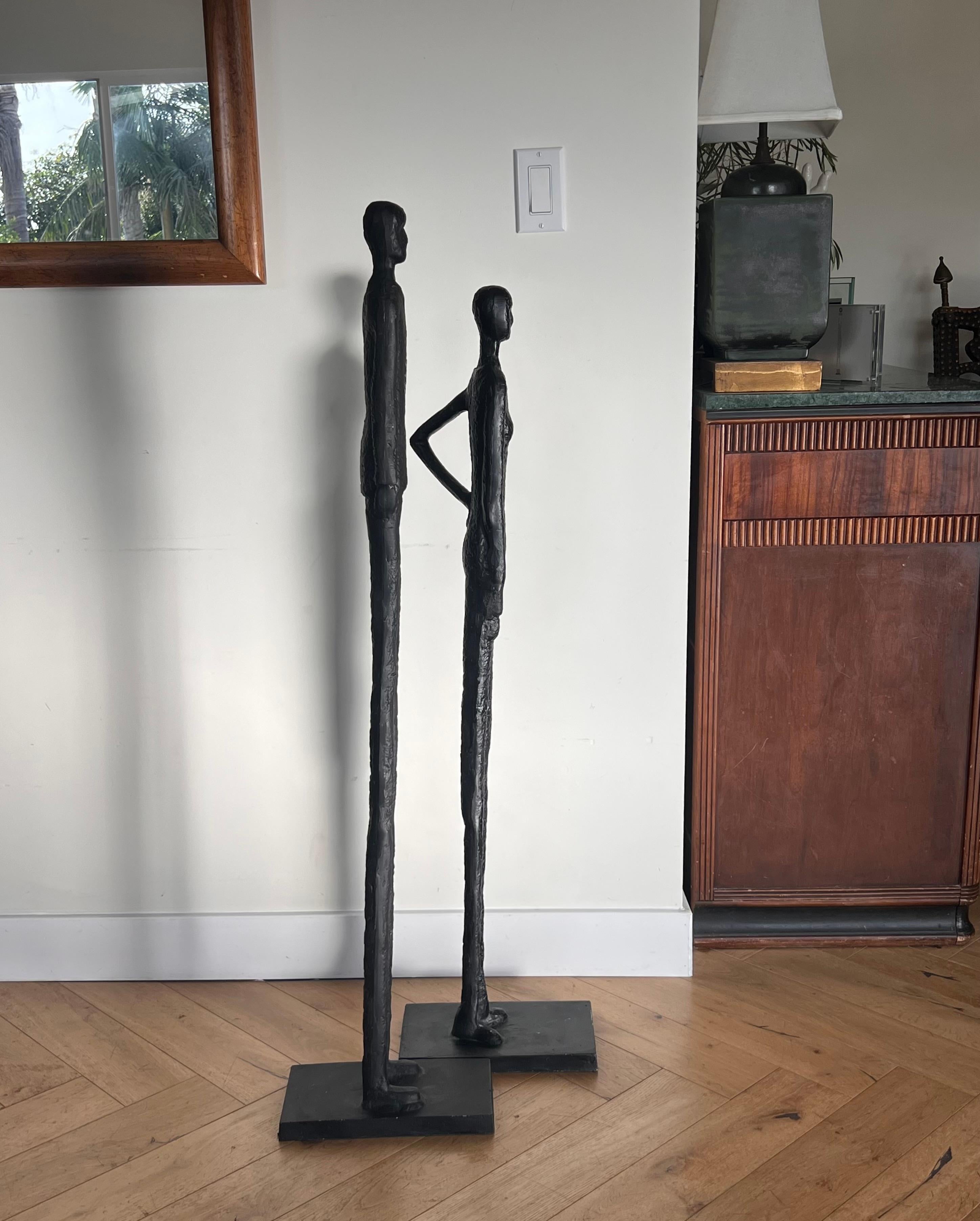 Expressionist A tall pair of Giacometti style figurative floor sculptures, 20th century