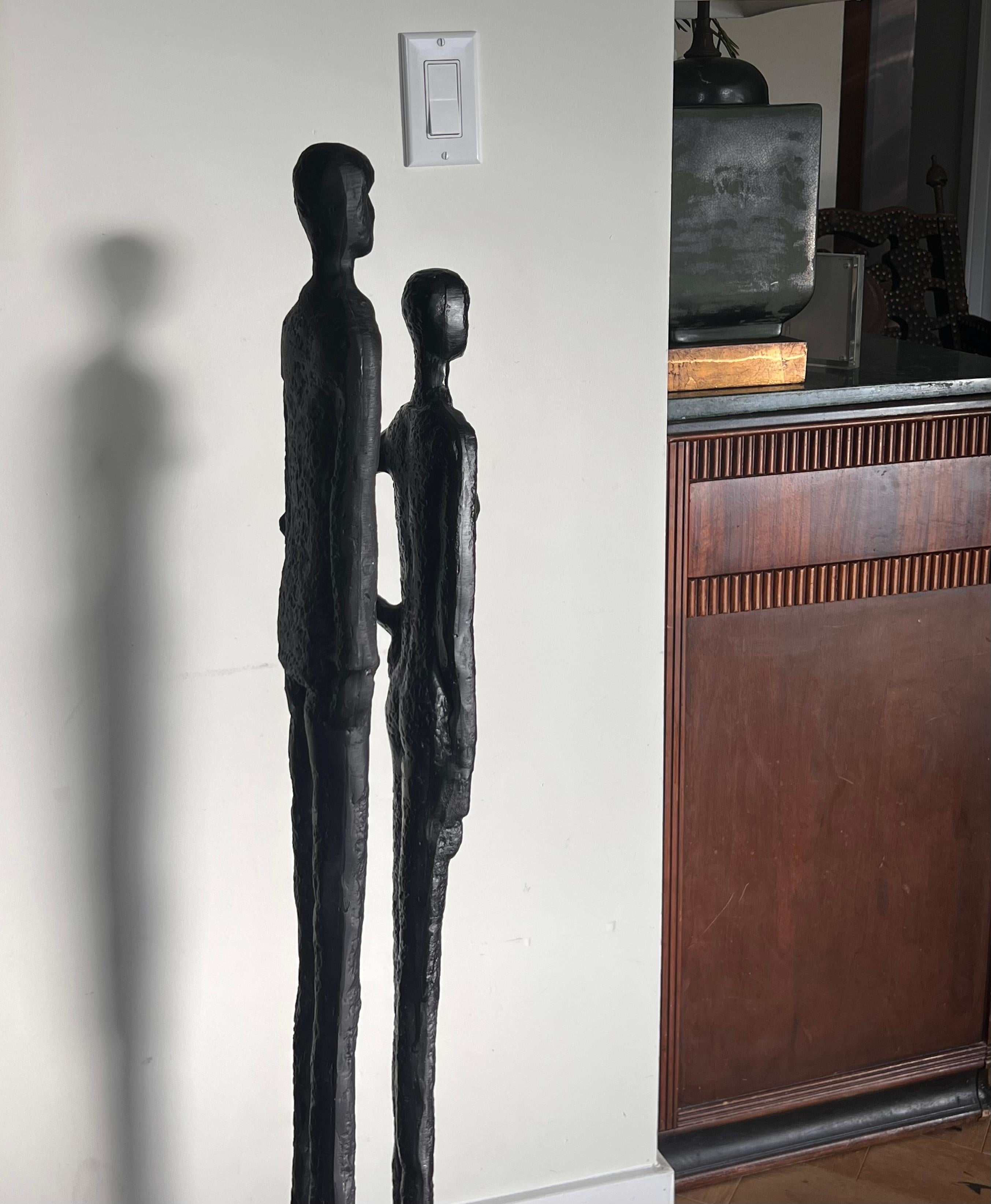 Unknown A tall pair of Giacometti style figurative floor sculptures, 20th century 