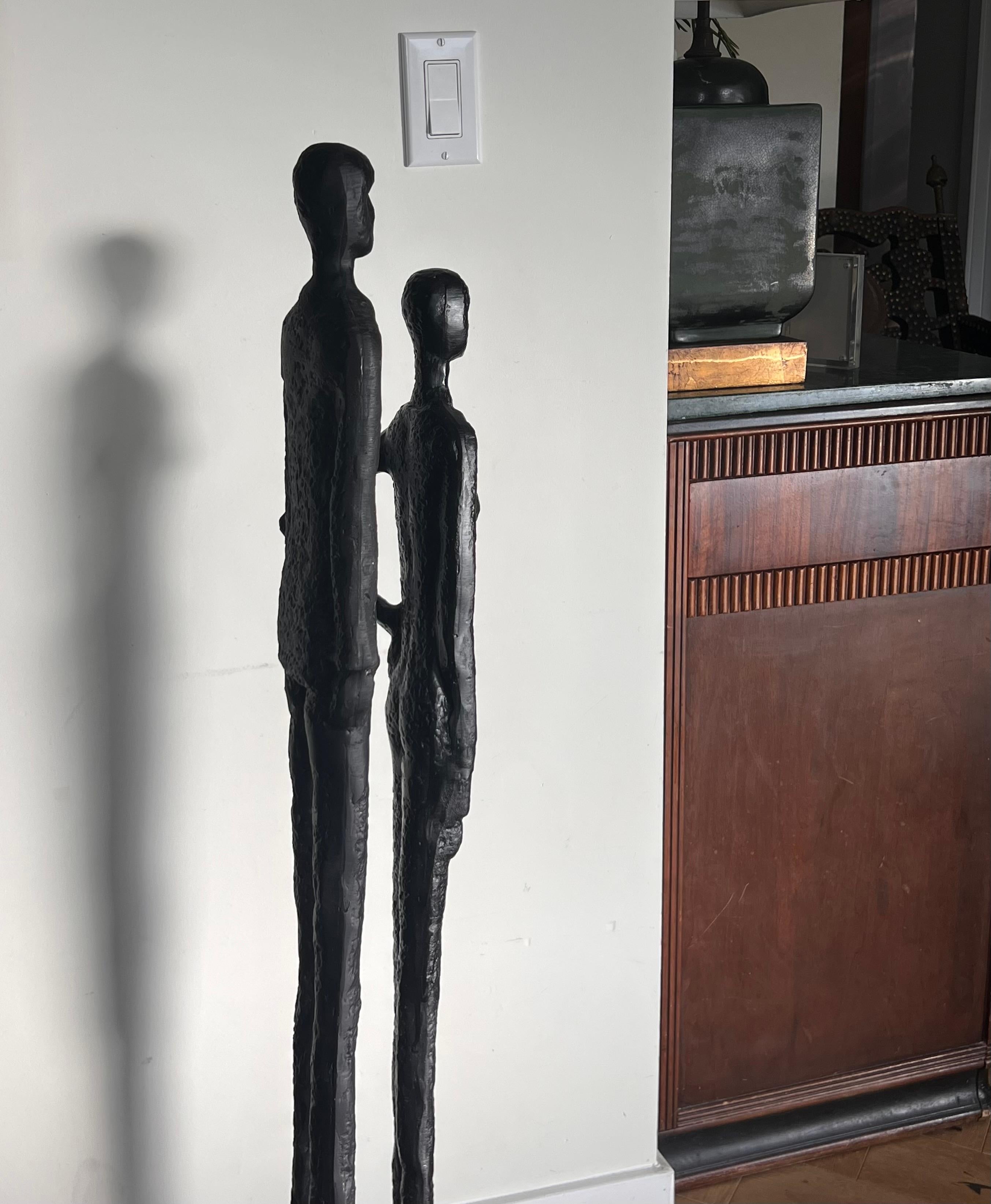 Unknown A tall pair of Giacometti style figurative floor sculptures, 20th century