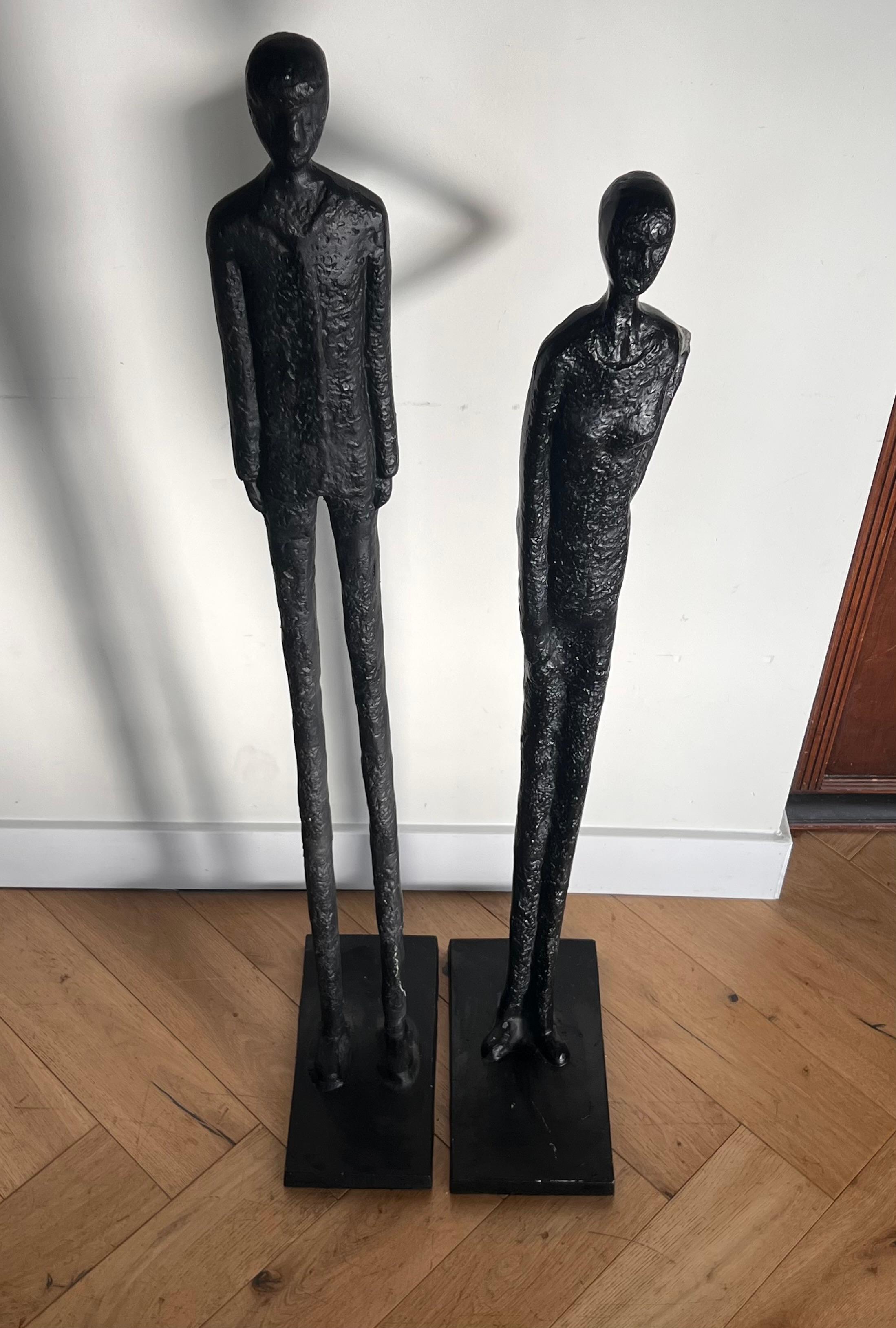A tall pair of Giacometti style figurative floor sculptures, 20th century In Good Condition In View Park, CA