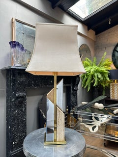 A Tall Skyscaper Table Lamp In Travertine Chrome And Brass By Sciolari