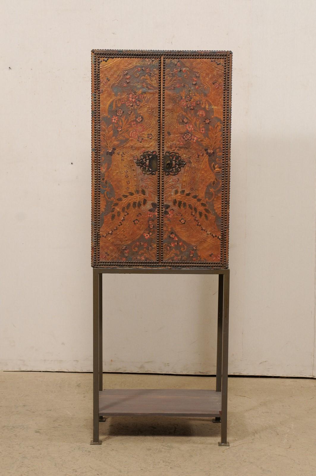 Tall Spanish Antique Embossed Leather Cabinet, Raised on Custom Iron Base In Good Condition For Sale In Atlanta, GA