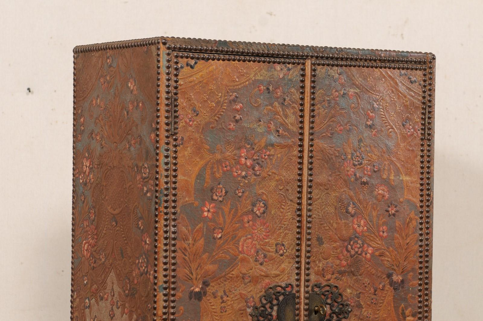 20th Century Tall Spanish Antique Embossed Leather Cabinet, Raised on Custom Iron Base For Sale
