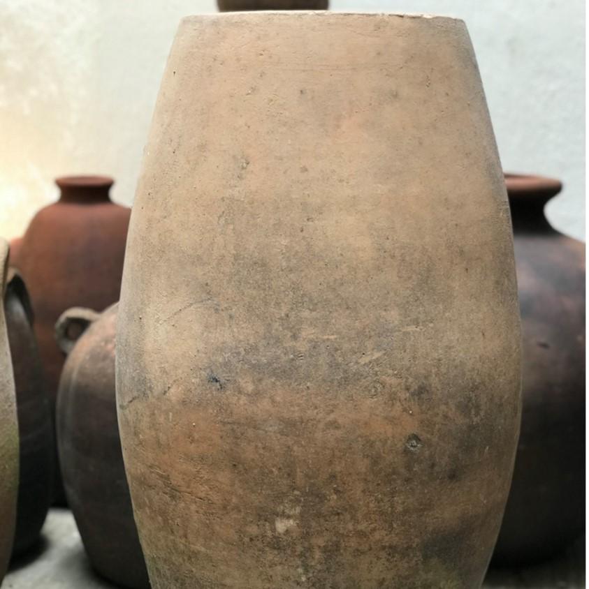 Carmen is a tall vintage terracotta vessel discovered in a potters studio in the region of Jalisco, Mexico. This terracotta pieces has very elegant patina. This piece can used as a garden feature, entrance piece or as a decorative interior