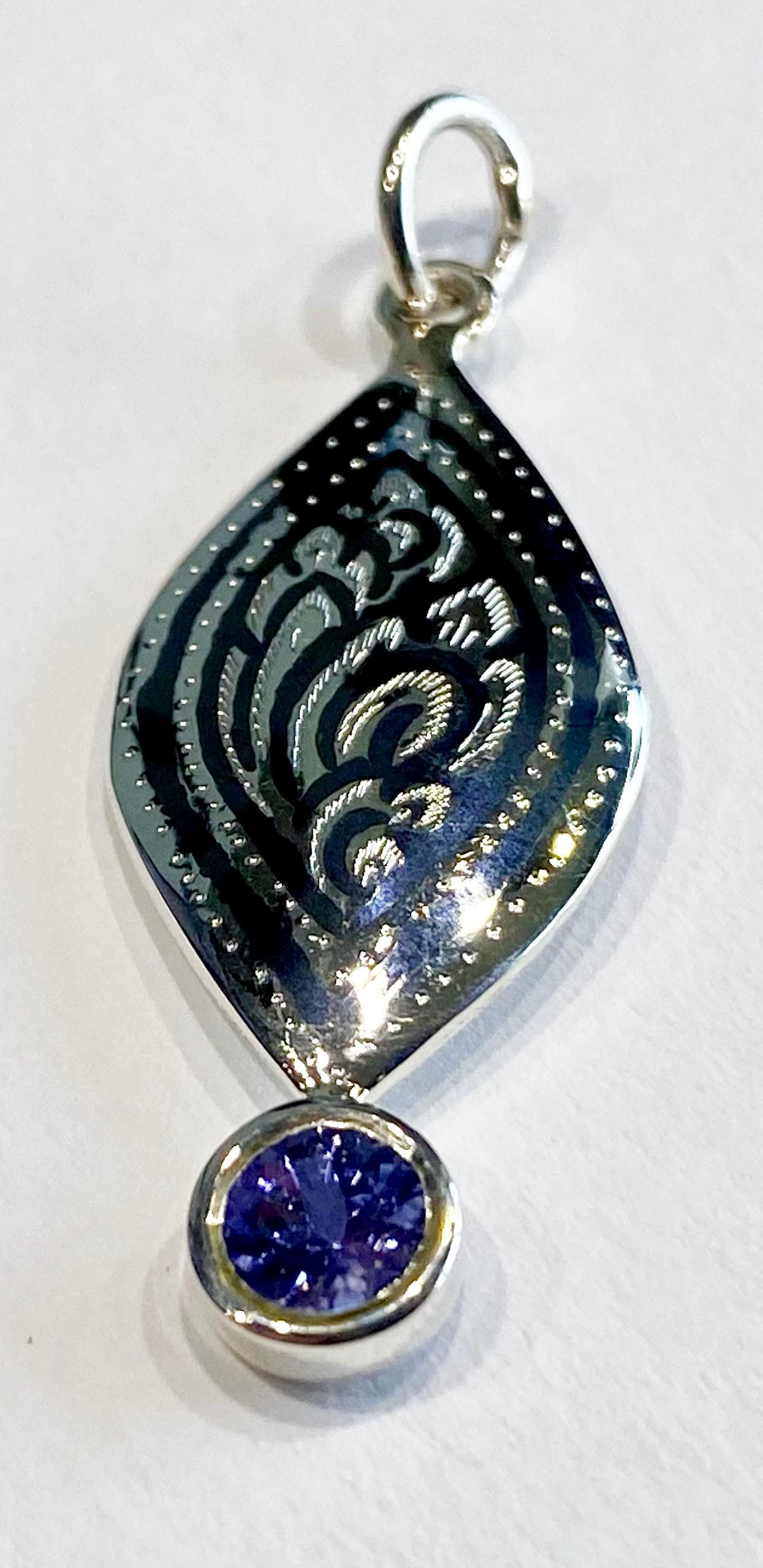 A Silver Filagree Pendant set with a 5MM Round Tanzanite  In New Condition For Sale In Seattle, WA