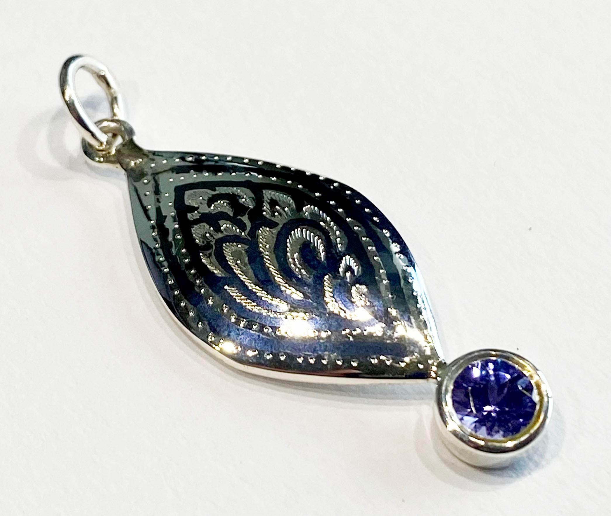 A Silver Filagree Pendant set with a 5MM Round Tanzanite  For Sale 2