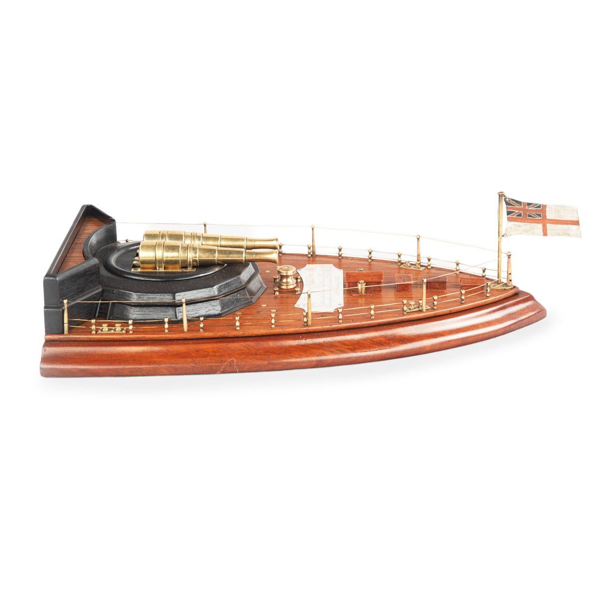 Brass A Teak Model of the Stern of HMS Howe, Presented to Captain Assheton Gore For Sale