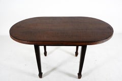 A Teak Wood Oval Dining Table