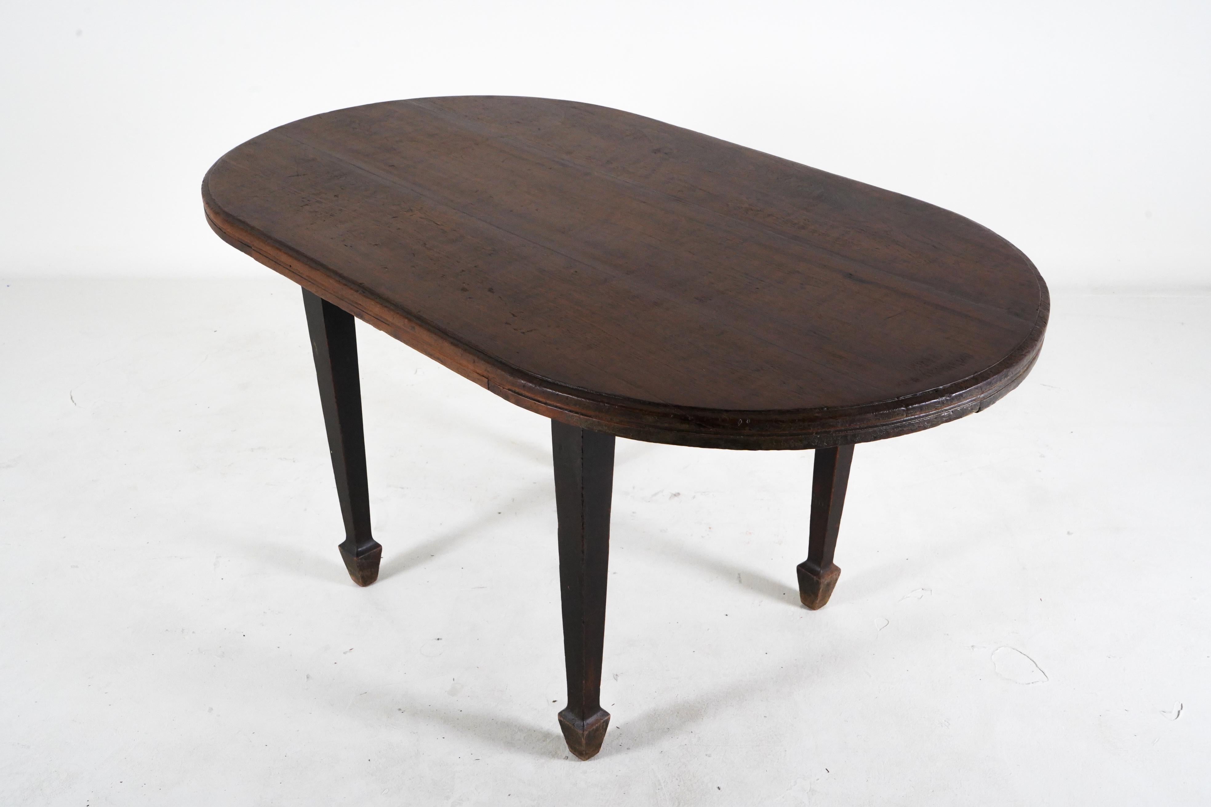 British Colonial A Teak Wood Oval Dining Table For Sale