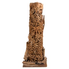 A Teakwood Carving of an Orchid