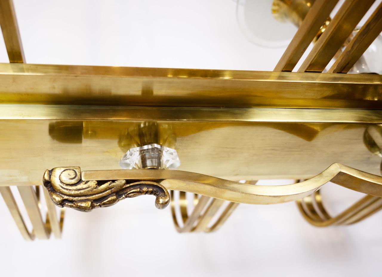 Français Lustre français à dix lumières des années 1940 dans le style de Jules Leleu en vente