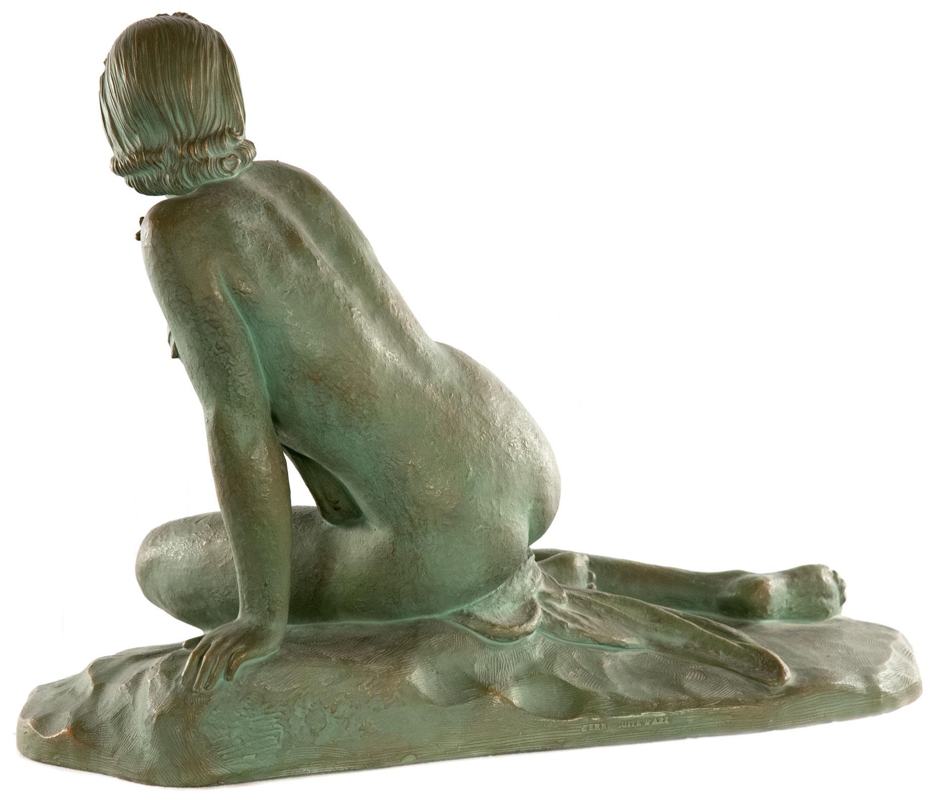 This beautiful, green patinated terracotta sculpture represents a typical Art Deco work by Italian sculptor Ugo Cipriani.