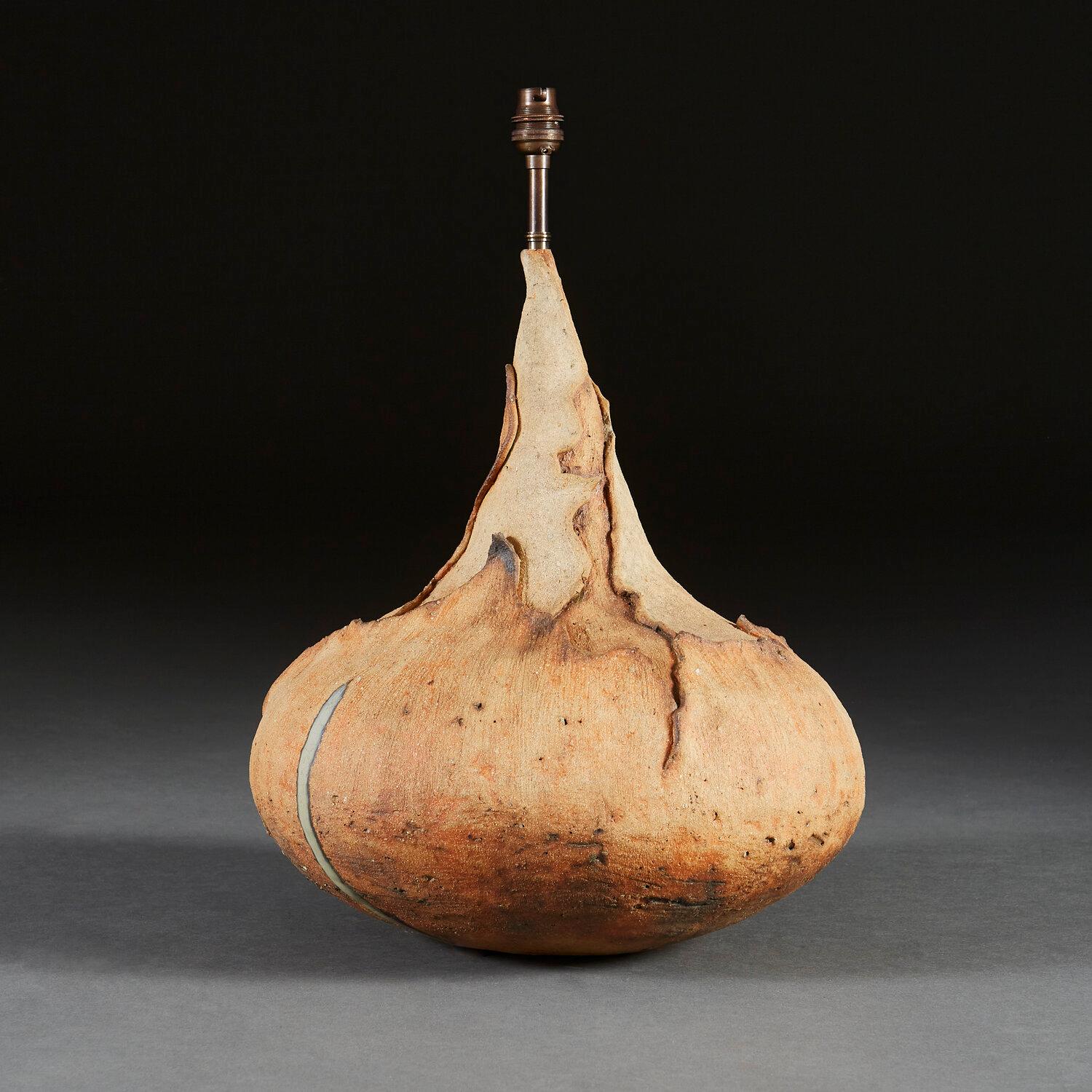 An unusual early twentieth century terracotta onion, with textured layers, now as a lamp.

Please note that the lampshade is not included, and that the lamp is currently wired for the UK.