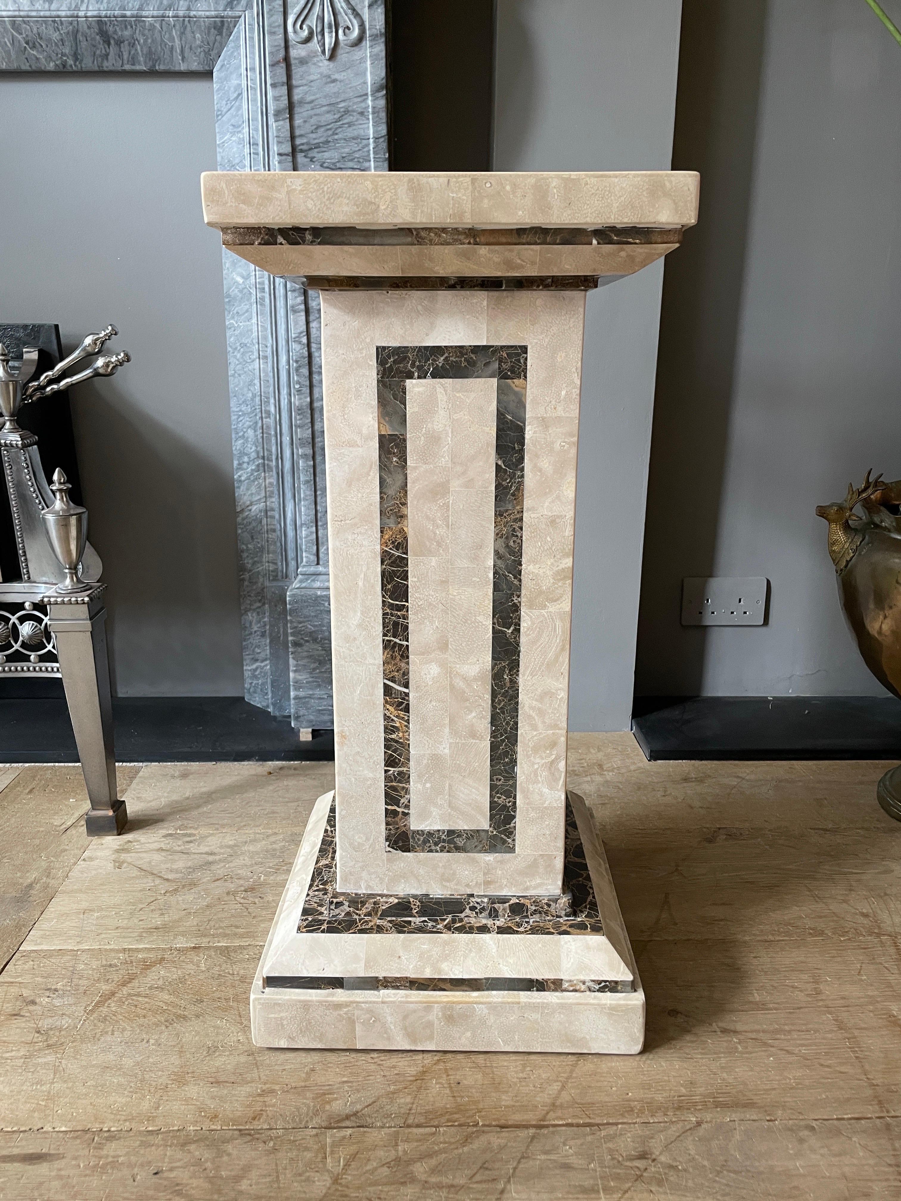 A tessellated marble pedestal or plinth, with Italian Portoro marble panels. Square base and square top. A versatile and useful piece for display.

American circa 1980.