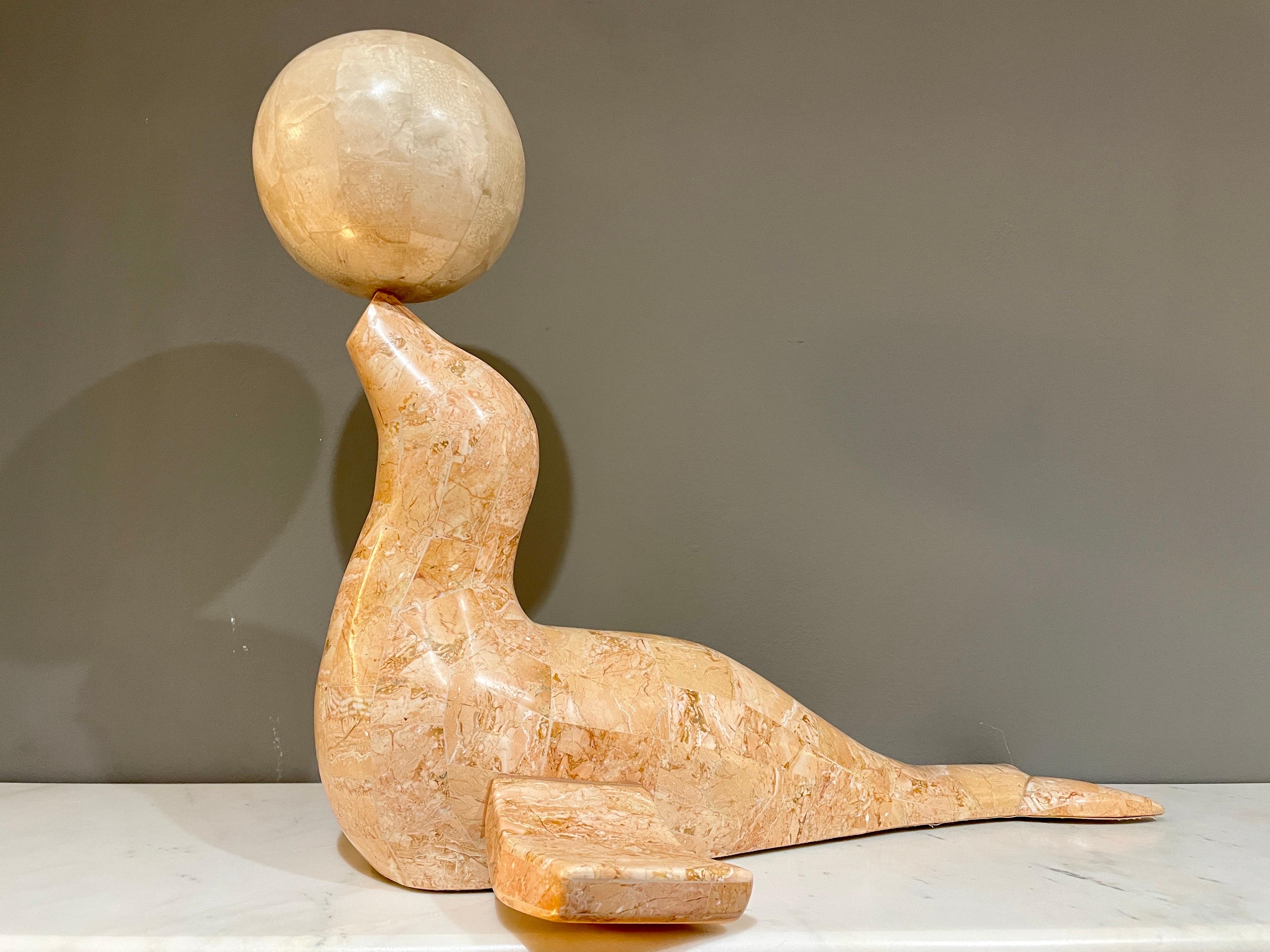 A stylised Seal balancing a ball in tessellated marble by Maitland Smith USA. Great form, movement and size.

Circa 1970's -80