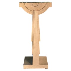 A tessellated stone faux travertine pedestal by Magnussen, late 20th century