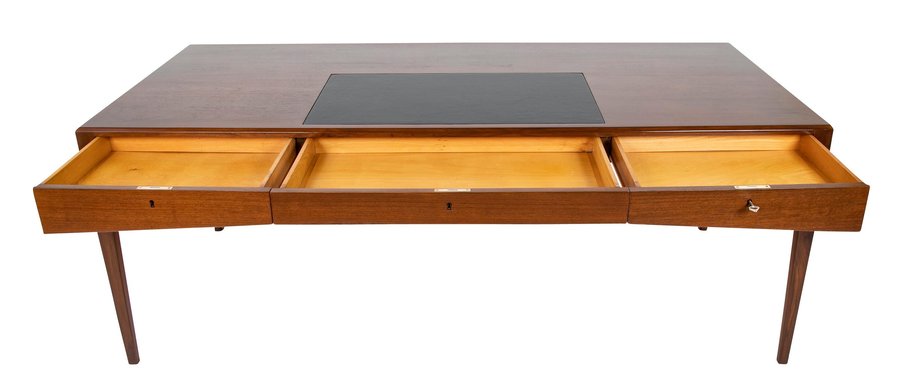 Three Drawer Teak Desk with Leather Insert in Top Designed by Severin Hansen In Good Condition For Sale In Stamford, CT