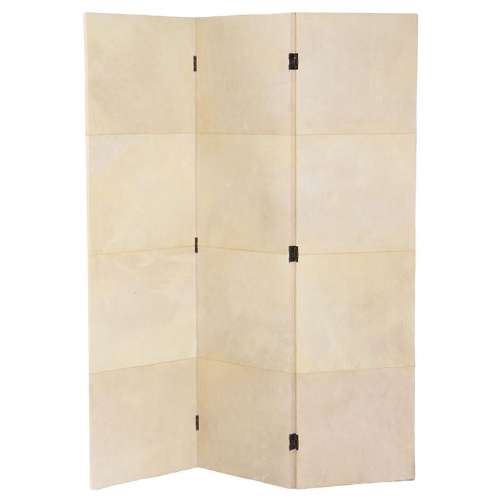A three panel parchment covered folding screen, Contemporary